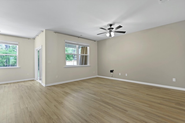 318 Bering Ln, Summerville, SC 29486 - spare room featuring light wood-type flooring, baseboards, and ceiling fan