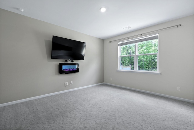 318 Bering Ln, Summerville, SC 29486 - unfurnished living room featuring baseboards and carpet floors