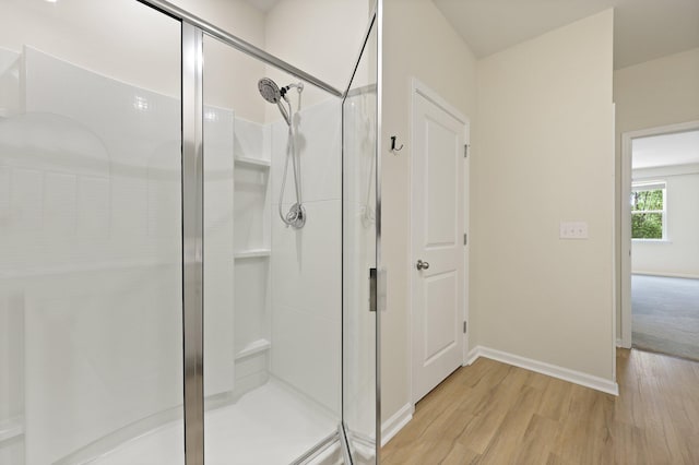 318 Bering Ln, Summerville, SC 29486 - bathroom with baseboards, a stall shower, and wood finished floors