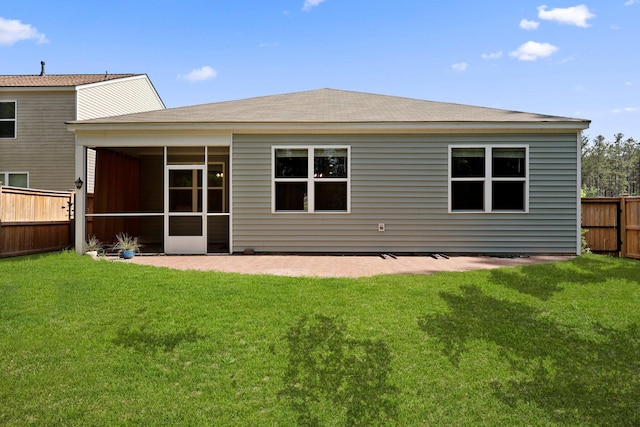 318 Bering Ln, Summerville, SC 29486 - rear view of property featuring a yard, a fenced backyard, a sunroom, and a patio area