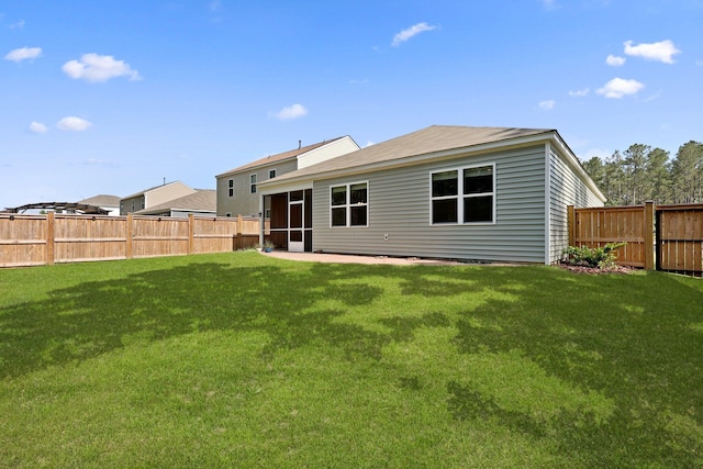 318 Bering Ln, Summerville, SC 29486 - back of house featuring a yard, a fenced backyard, and a sunroom