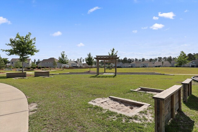 318 Bering Ln, Summerville, SC 29486 - view of property's community with a residential view, a pergola, and a lawn