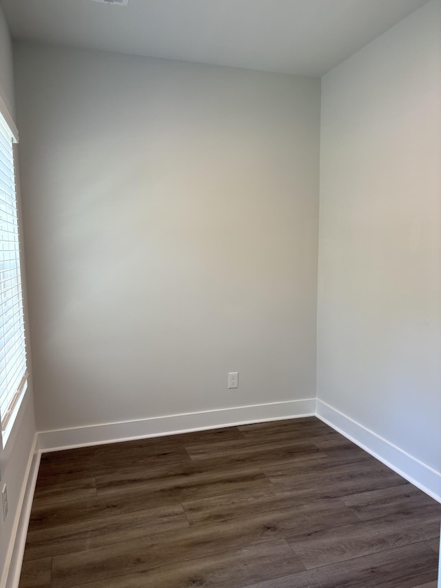 819 Burger St, Charleston, SC 29407 - unfurnished room with dark wood-type flooring, baseboards, and plenty of natural light