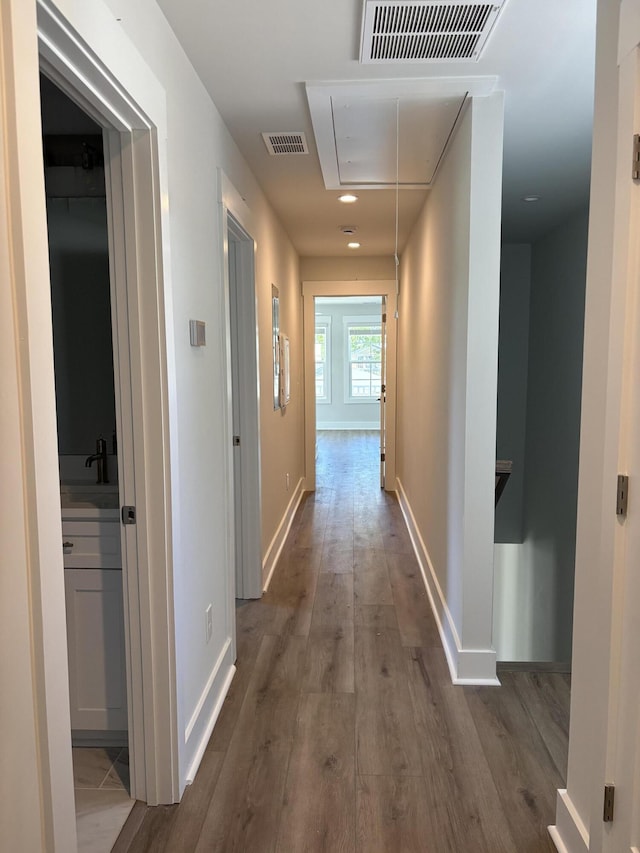 819 Burger St, Charleston, SC 29407 - corridor with wood finished floors, baseboards, and recessed lighting