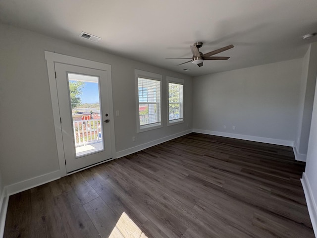 819 Burger St, Charleston, SC 29407 - empty room with dark wood-style flooring, a ceiling fan, baseboards, and a smoke detector