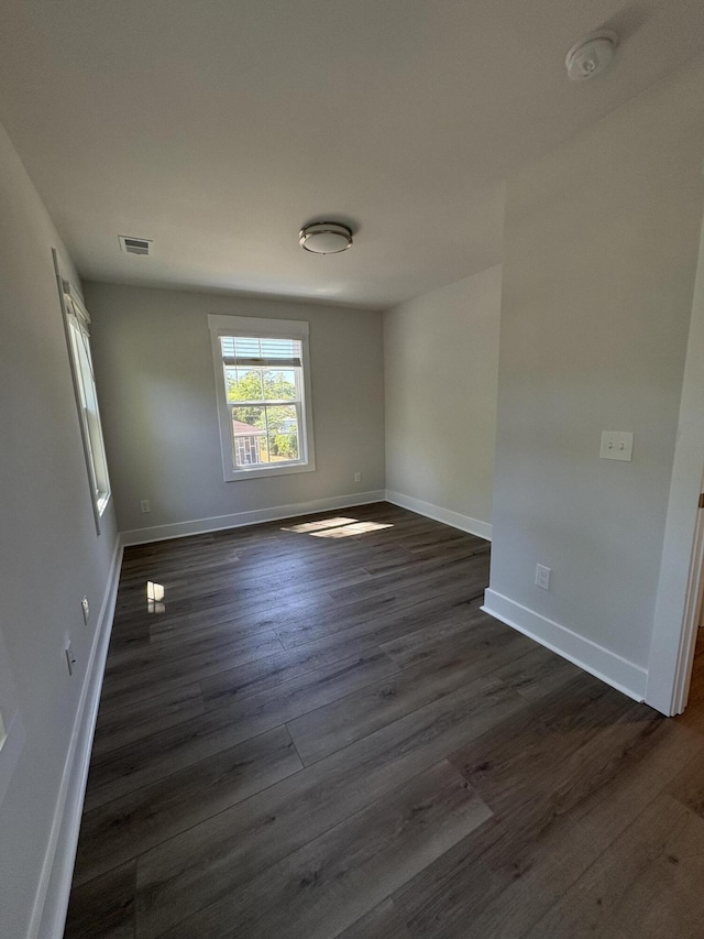 819 Burger St, Charleston, SC 29407 - unfurnished room featuring dark wood-style floors, baseboards, and a smoke detector