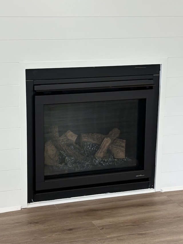 819 Burger St, Charleston, SC 29407 - detailed view of wood finished floors and a fireplace
