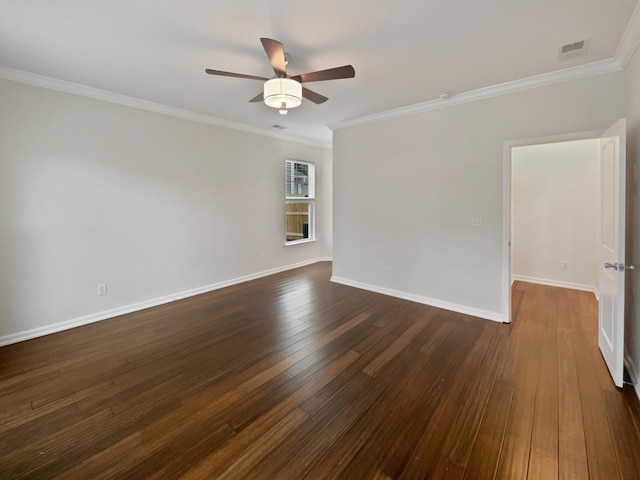 spare room with ceiling fan, dark hardwood / wood-style floors, and crown molding