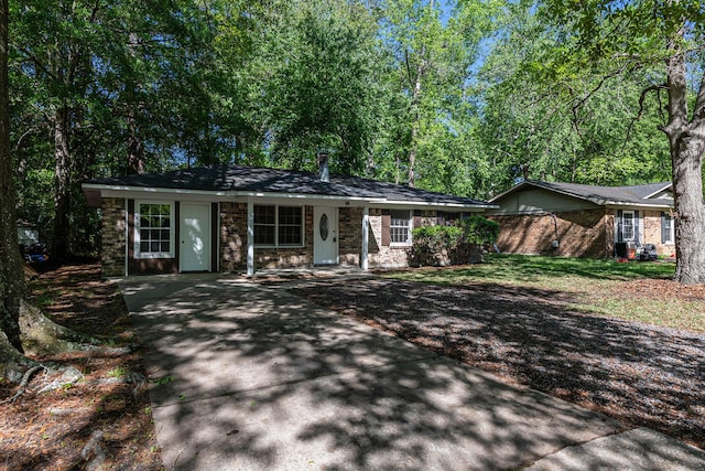 203 Elliott Dr, Ladson, SC 29456 - ranch-style home with brick siding and concrete driveway
