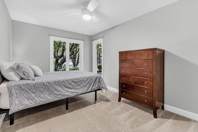 8 Pony Ln, Charleston, SC 29407 - bedroom with baseboards, light carpet, and ceiling fan