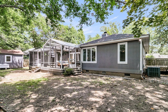 8 Pony Ln, Charleston, SC 29407 - rear view of house with crawl space, a sunroom, central AC, a deck, and a chimney