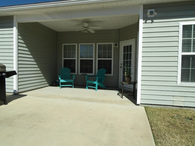 view of patio / terrace featuring a ceiling fan