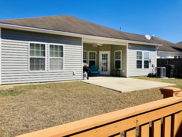 back of property featuring roof with shingles, a patio, central air condition unit, fence, and ceiling fan