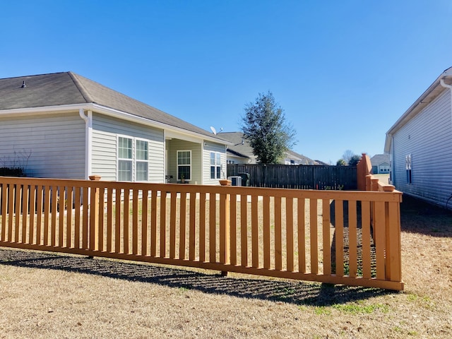 view of gate with fence