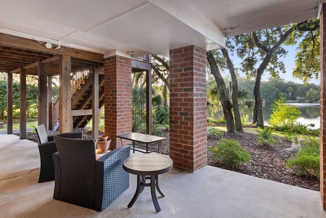 view of patio / terrace featuring a water view