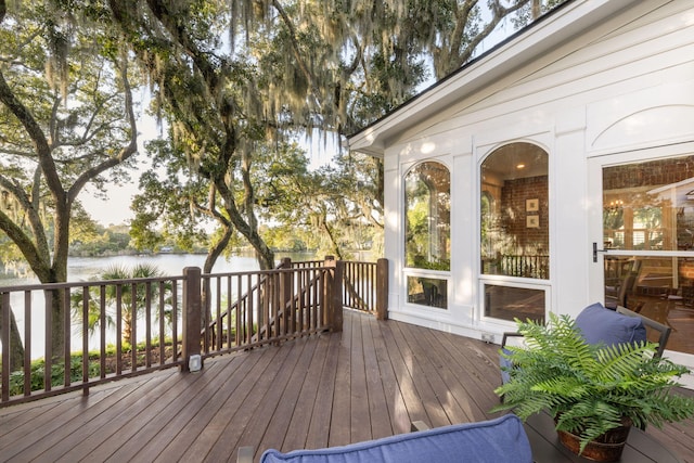 deck featuring a water view