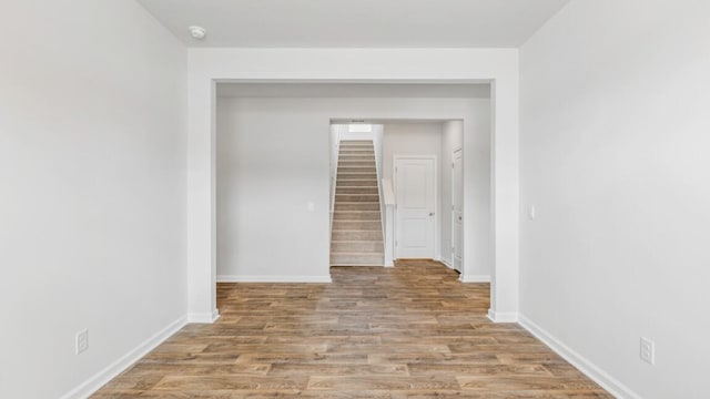 54 Twickenham Loop, Yemassee, SC 29945 - corridor featuring wood finished floors and stairway