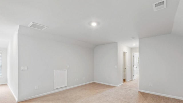 54 Twickenham Loop, Yemassee, SC 29945 - spare room with light carpet, recessed lighting, and vaulted ceiling