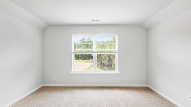 54 Twickenham Loop, Yemassee, SC 29945 - empty room featuring lofted ceiling and carpet flooring