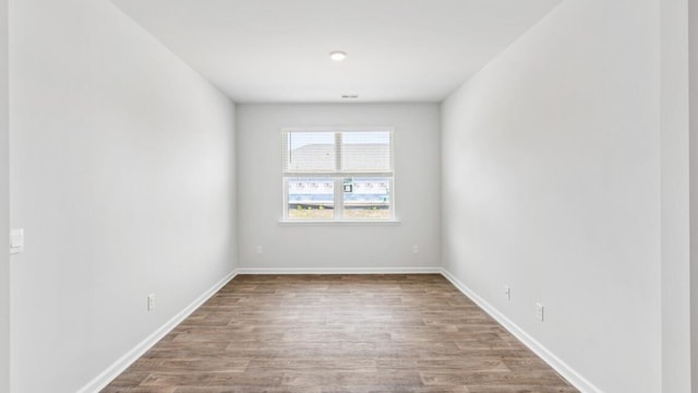 54 Twickenham Loop, Yemassee, SC 29945 - spare room with wood finished floors and baseboards