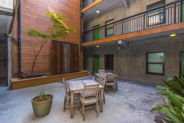 view of patio with a balcony