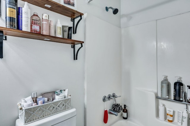 full bathroom featuring shower / bathing tub combination and toilet