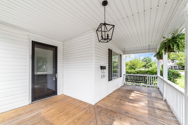 wooden terrace featuring a porch