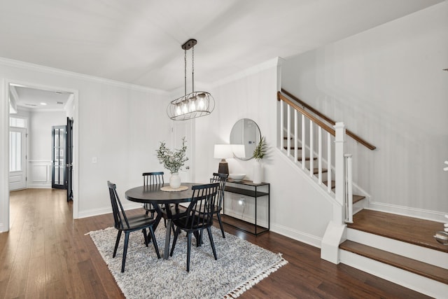 2267 Kemmerlin St, Johns Island, SC 29455 - dining area featuring stairway, wood finished floors, and crown molding