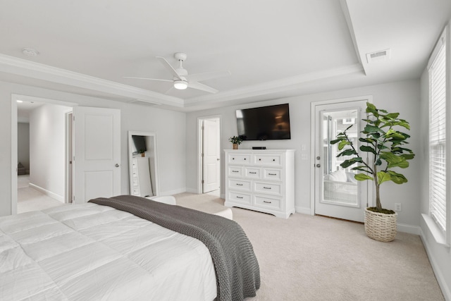2267 Kemmerlin St, Johns Island, SC 29455 - bedroom with a tray ceiling, light colored carpet, access to outside, crown molding, and a ceiling fan
