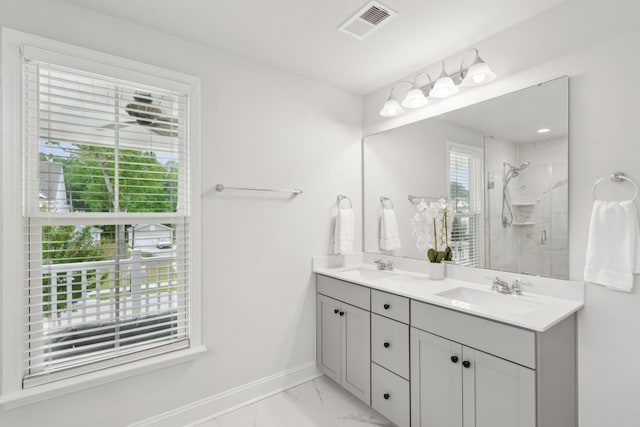 2267 Kemmerlin St, Johns Island, SC 29455 - bathroom featuring double vanity, a marble finish shower, and marble look tile flooring