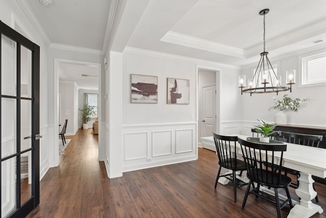 2267 Kemmerlin St, Johns Island, SC 29455 - dining space featuring a chandelier, dark wood-style floors, a wainscoted wall, and ornamental molding