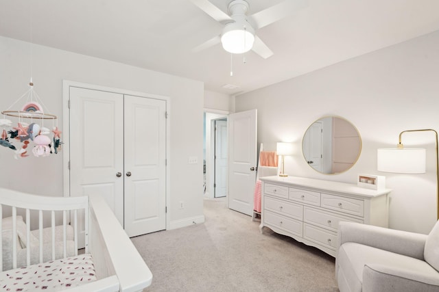 2267 Kemmerlin St, Johns Island, SC 29455 - bedroom featuring light colored carpet, a closet, a crib, and ceiling fan