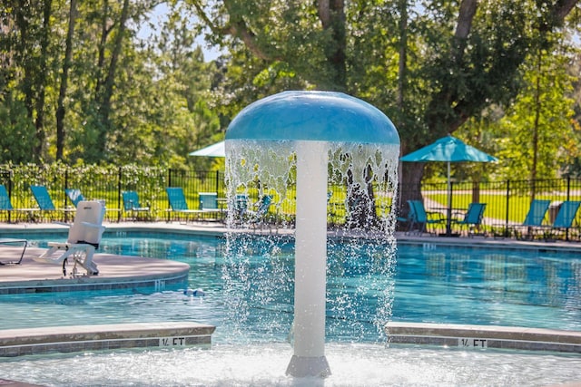 2267 Kemmerlin St, Johns Island, SC 29455 - community pool with a patio and view of wooded area