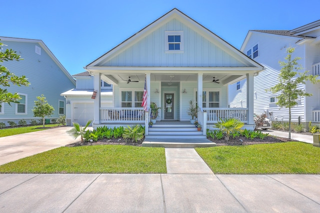 1787 Timmons St, Mount Pleasant, SC 29466 - bungalow-style home with board and batten siding, covered porch, ceiling fan, and a front lawn