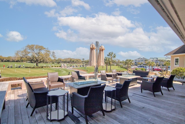 2655 Gnarled Pne, Seabrook Island, SC 29455 - deck with an area to practice putting, golf course view, and an outdoor living space with a fire pit