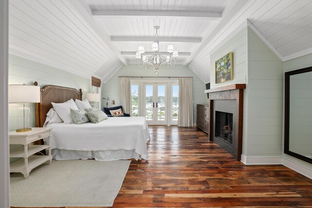 4855 Retriever Rd, Wadmalaw Island, SC 29487 - bedroom featuring a chandelier, dark wood finished floors, a fireplace, and wooden walls