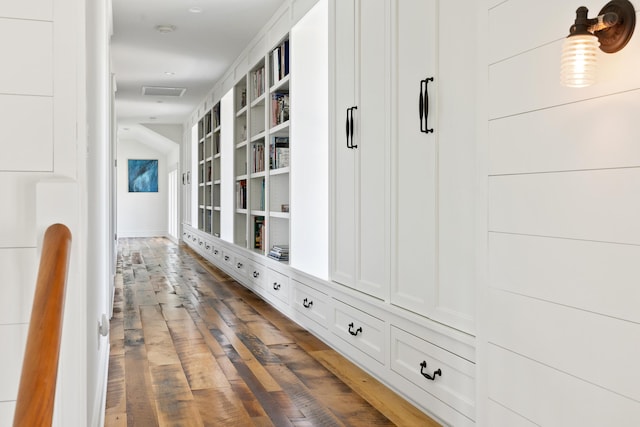 4855 Retriever Rd, Wadmalaw Island, SC 29487 - hallway featuring hardwood / wood-style floors and built in shelves