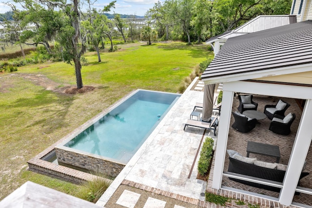 4855 Retriever Rd, Wadmalaw Island, SC 29487 - swimming pool with an outdoor living space, a patio area, a yard, and view of wooded area