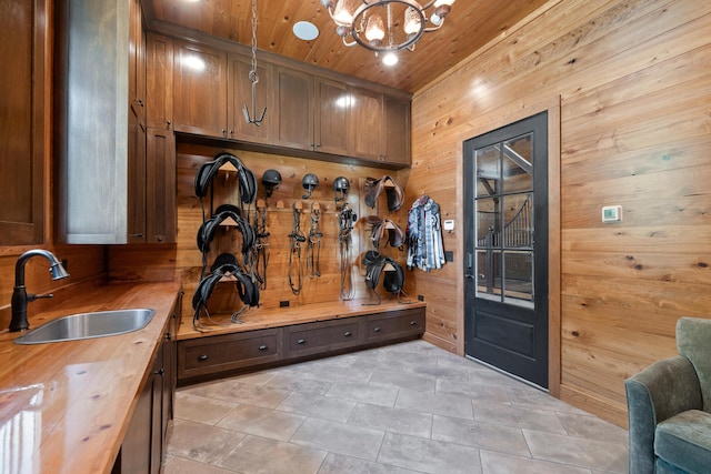 4855 Retriever Rd, Wadmalaw Island, SC 29487 - mudroom with a sink, wood walls, a chandelier, and wooden ceiling