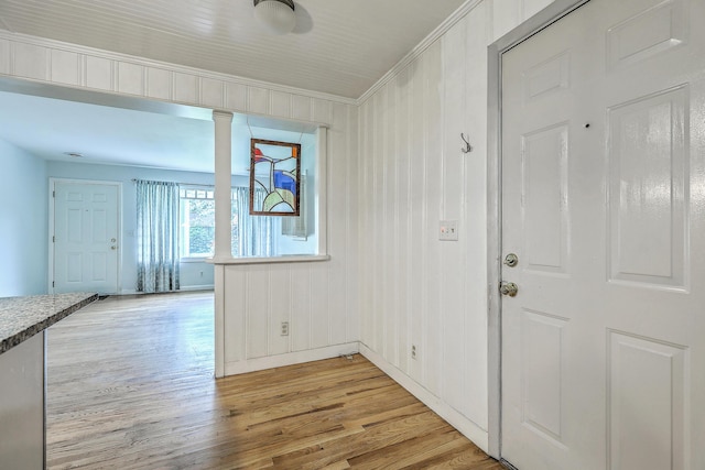 4729 Lang Ridge Dr, North Charleston, SC 29405 - foyer featuring crown molding, light wood finished floors, ornate columns, and baseboards
