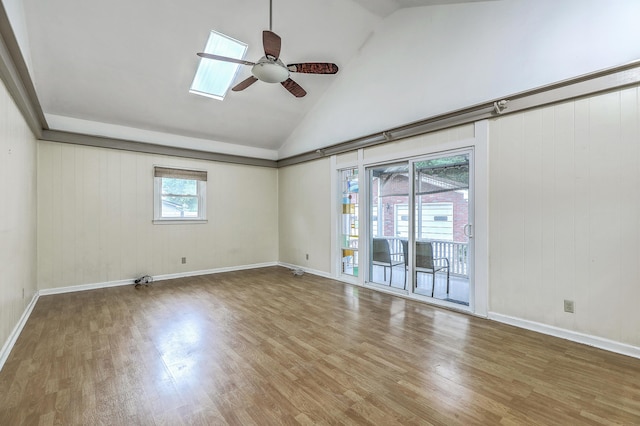 4729 Lang Ridge Dr, North Charleston, SC 29405 - spare room with ceiling fan, wood finished floors, high vaulted ceiling, and baseboards