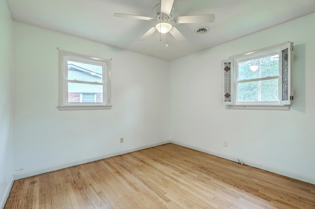 4729 Lang Ridge Dr, North Charleston, SC 29405 - empty room featuring light wood-style flooring, ceiling fan, and baseboards