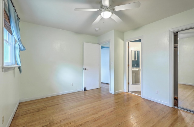 4729 Lang Ridge Dr, North Charleston, SC 29405 - unfurnished bedroom featuring light wood-type flooring, baseboards, connected bathroom, and a ceiling fan