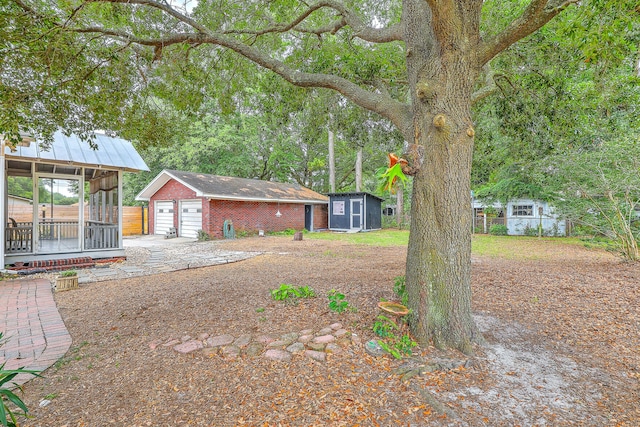 4729 Lang Ridge Dr, North Charleston, SC 29405 - view of yard featuring a detached garage
