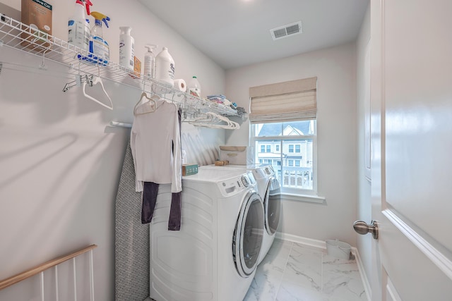 laundry room featuring independent washer and dryer