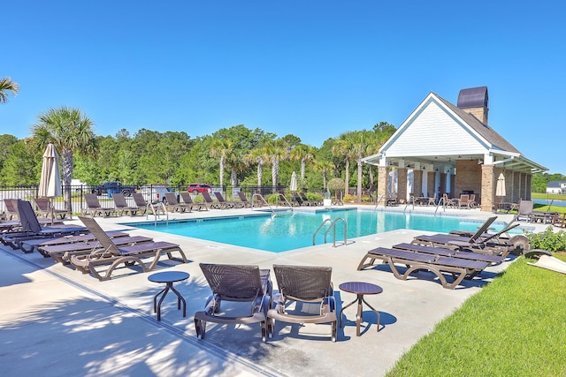 view of pool featuring a patio