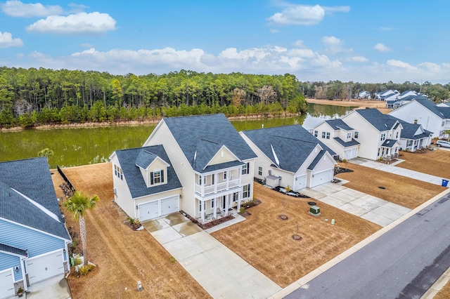 bird's eye view with a water view