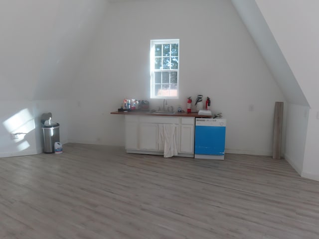 1236 Eutaw Rd, Eutawville, SC 29048 - additional living space featuring a sink, light wood-style flooring, and vaulted ceiling