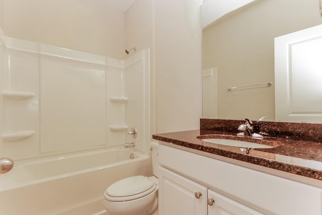 bathroom with vanity, toilet, and bathing tub / shower combination