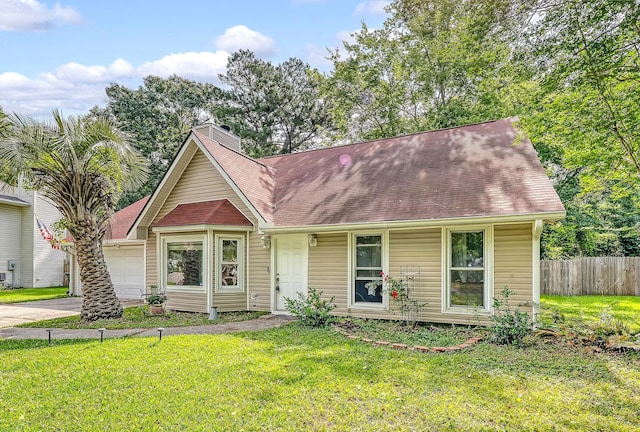 4606 Moss Ct, North Charleston, SC 29420 - view of front of property with a garage, a chimney, roof with shingles, and driveway